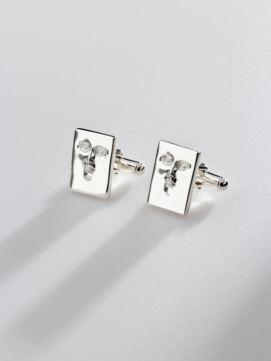 Wall cufflinks with face